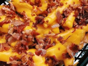 PAPAS CON QUESO Y TOCINO EN IGUALA