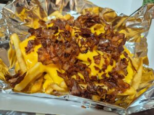 PAPAS CON QUESO Y TOCINO AHUMADO